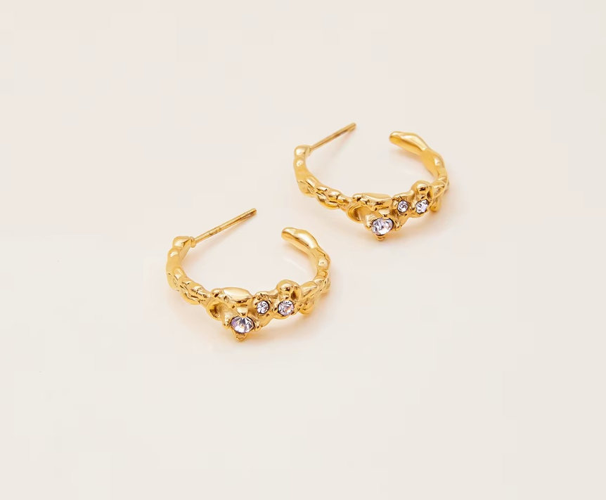 Diseño en flor en combinación de colores dorado y plateado, delicado y ajustable.